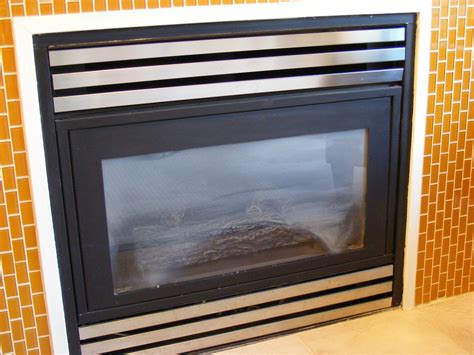 taking glass off gas fireplace